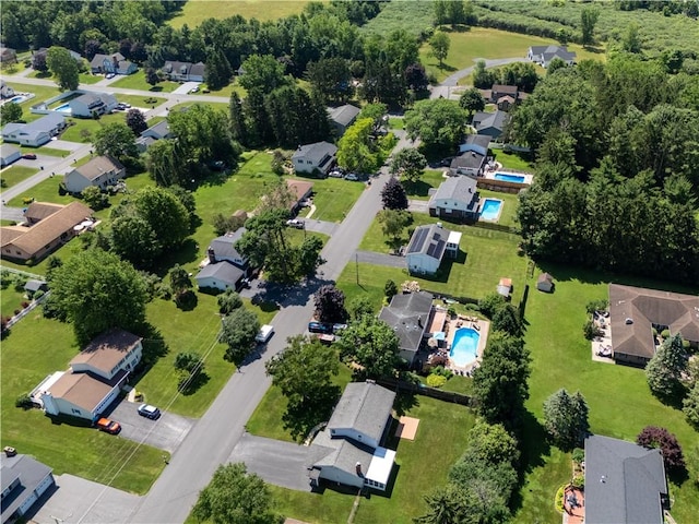 55 Wegman St, Sennett, NY 13021 - aerial overview of property's location with a pool area and nearby suburban area