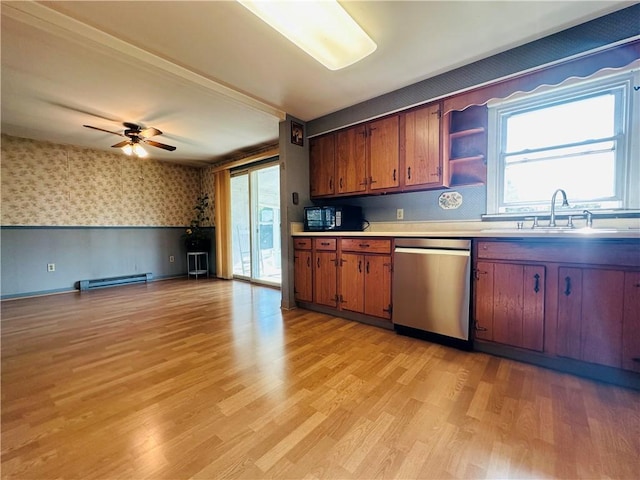 55 Wegman St, Sennett, NY 13021 - kitchen featuring stainless steel dishwasher, wallpapered walls, light countertops, light wood-style flooring, and plenty of natural light