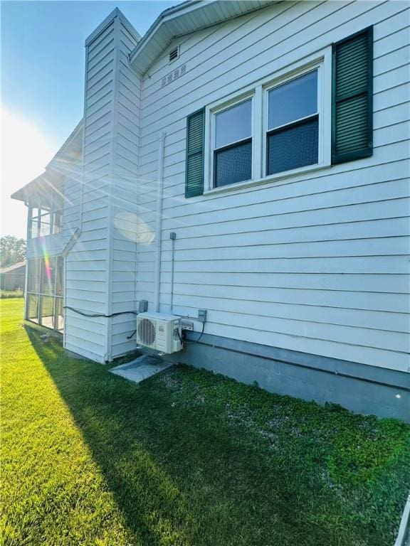 55 Wegman St, Sennett, NY 13021 - view of home's exterior with a cooling unit and a lawn