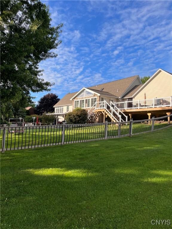 115 Meaney Cir, Scriba, NY 13126 - rear view of house with a deck and stairs