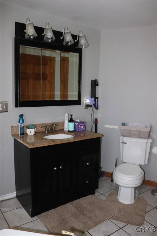 115 Meaney Cir, Scriba, NY 13126 - bathroom with vanity and tile patterned flooring