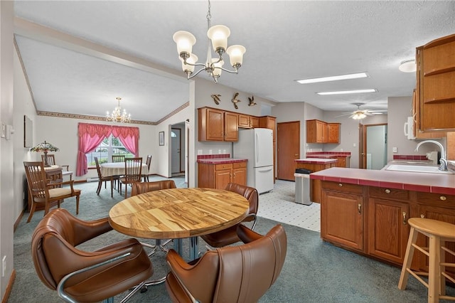 7219 Apple St, Bath, NY 14810 - dining space with a chandelier, light colored carpet, vaulted ceiling, and a textured ceiling