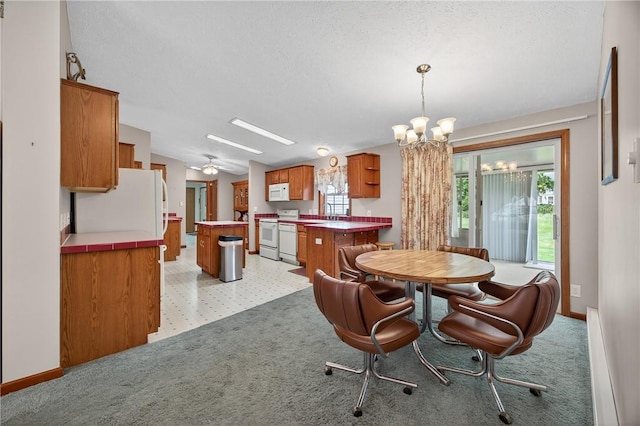 7219 Apple St, Bath, NY 14810 - dining room featuring a chandelier and healthy amount of natural light