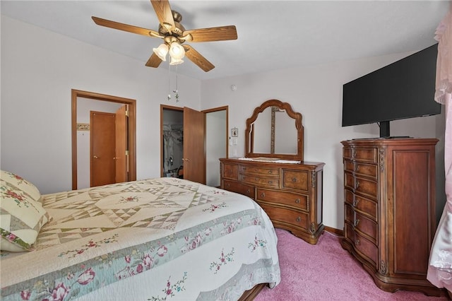 7219 Apple St, Bath, NY 14810 - bedroom with light carpet, a spacious closet, and a ceiling fan