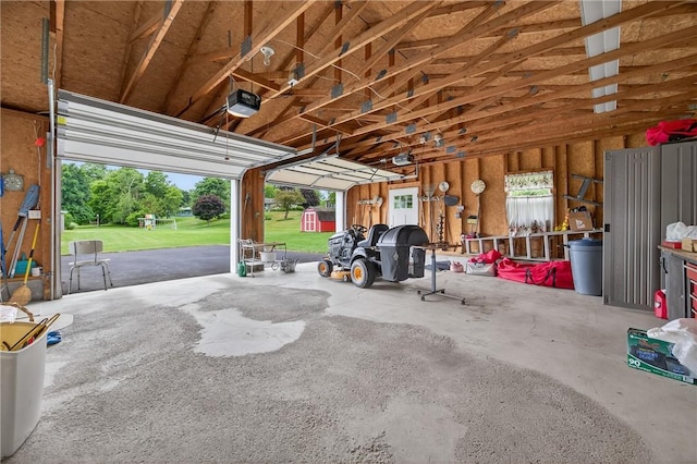 7219 Apple St, Bath, NY 14810 - garage featuring a garage door opener