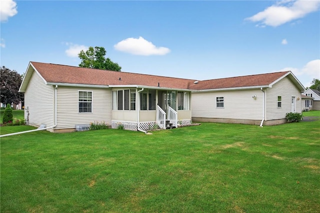 7219 Apple St, Bath, NY 14810 - back of property featuring a sunroom, a yard, and entry steps