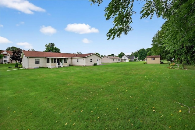 7219 Apple St, Bath, NY 14810 - view of grassy yard with an outdoor structure