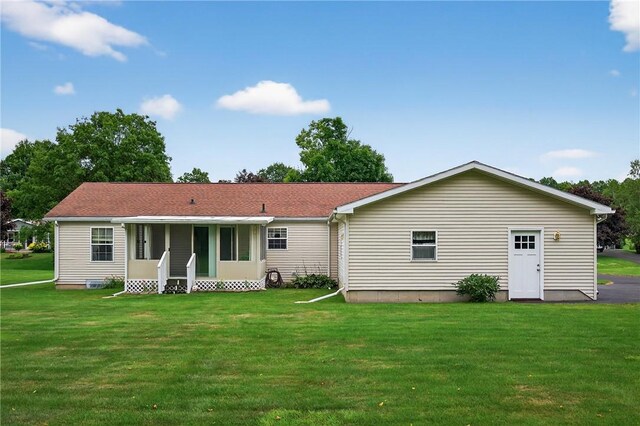 7219 Apple St, Bath, NY 14810 - rear view of house featuring a lawn