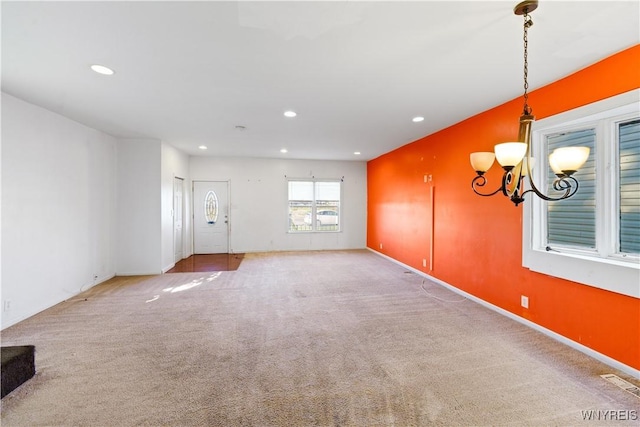 2275 Broadway St, Cheektowaga, NY 14212 - empty room with carpet floors, recessed lighting, and a chandelier