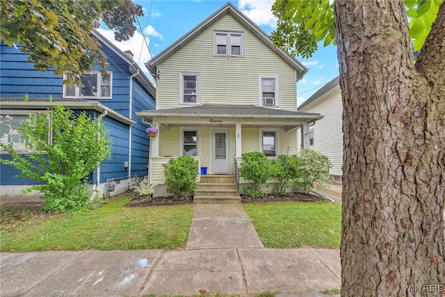 11 7th Ave, North Tonawanda, NY 14120 - traditional style home with covered porch and a front lawn