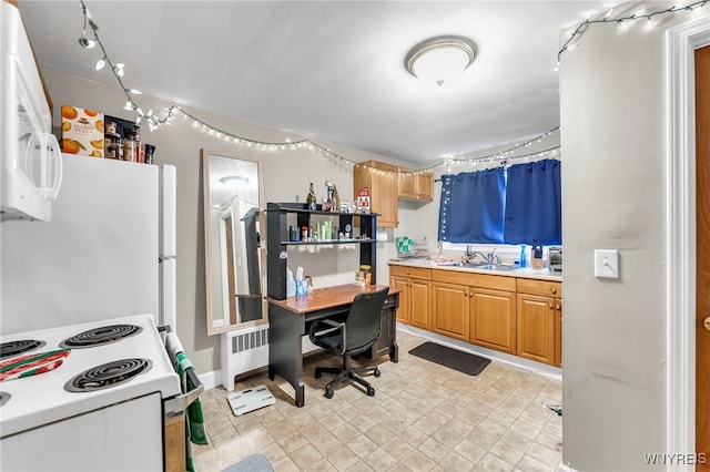 11 7th Ave, North Tonawanda, NY 14120 - kitchen featuring radiator, white appliances, light countertops, and an office area