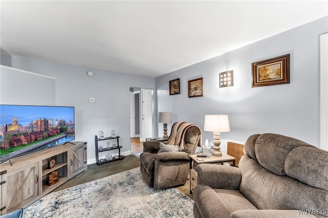 11 7th Ave, North Tonawanda, NY 14120 - carpeted living room featuring baseboards