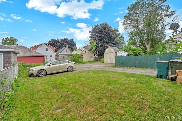 11 7th Ave, North Tonawanda, NY 14120 - view of yard featuring a shed, driveway, and a residential view