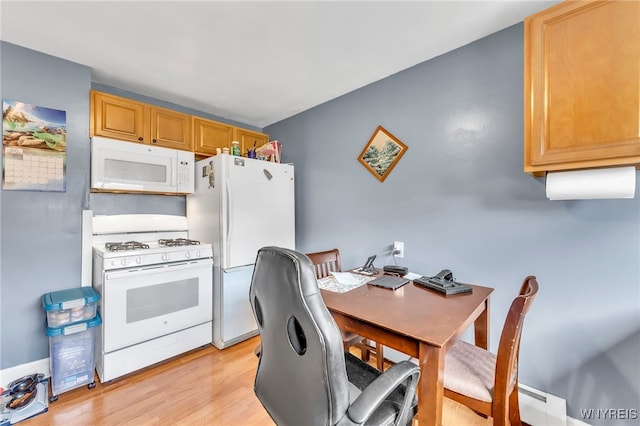 11 7th Ave, North Tonawanda, NY 14120 - kitchen with white appliances, light wood finished floors, and a desk