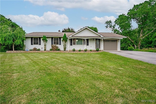 283 Erin Rd, Ridgeway, NY 14103 - ranch-style home with a garage, driveway, and a front lawn