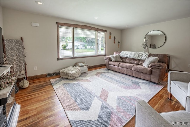 283 Erin Rd, Ridgeway, NY 14103 - living room featuring wood finished floors and recessed lighting