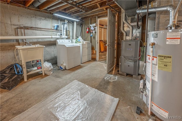 283 Erin Rd, Ridgeway, NY 14103 - unfinished basement featuring water heater, separate washer and dryer, and heating unit
