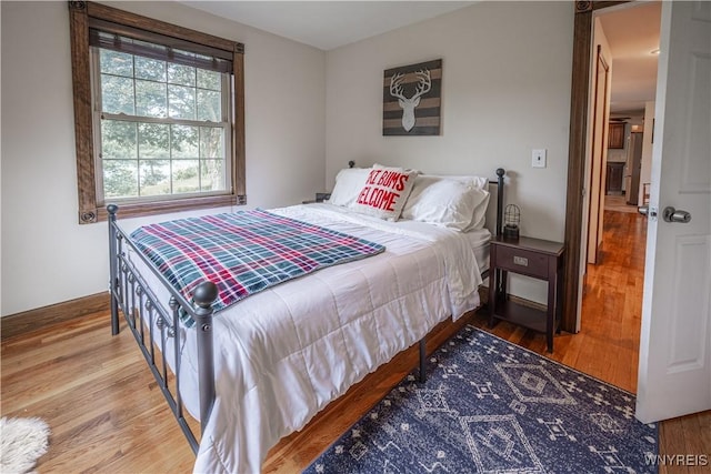 283 Erin Rd, Ridgeway, NY 14103 - bedroom featuring wood finished floors