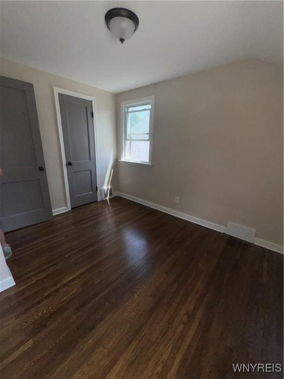 129 Brookside Dr, West Seneca, NY 14220 - spare room with dark wood finished floors and baseboards