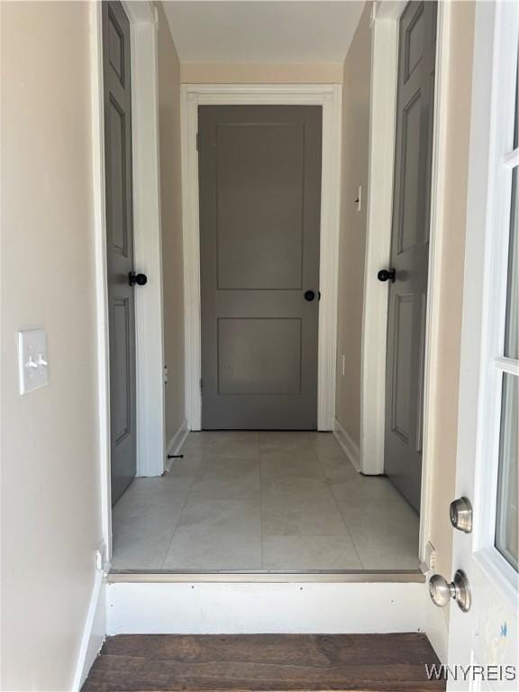 129 Brookside Dr, West Seneca, NY 14220 - corridor with baseboards and light tile patterned floors