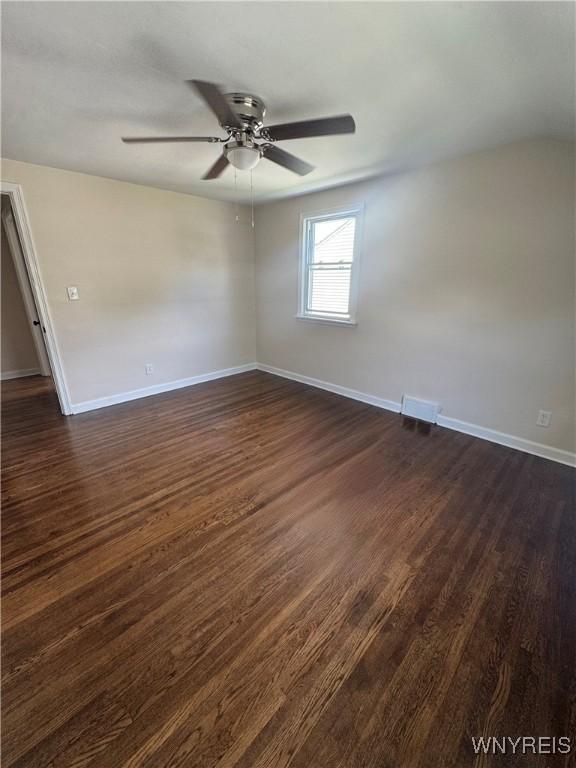 129 Brookside Dr, West Seneca, NY 14220 - spare room featuring a ceiling fan and dark wood-type flooring