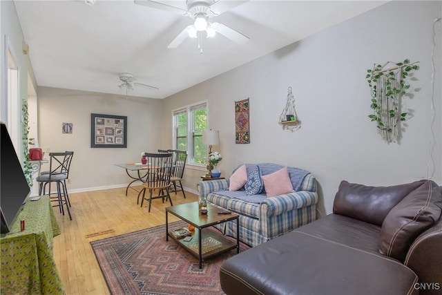 101 Comstock Ave, Syracuse, NY 13210 - living area featuring ceiling fan and wood finished floors