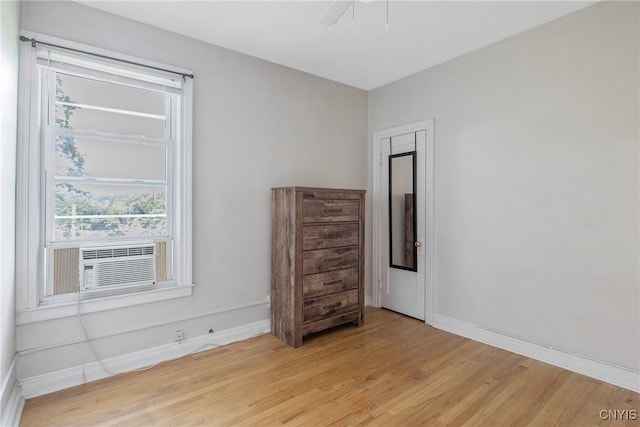 101 Comstock Ave, Syracuse, NY 13210 - spare room featuring light wood finished floors, ceiling fan, and cooling unit