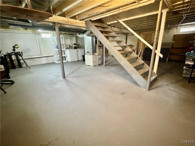 119 Marnie St, Deerfield, NY 13502 - below grade area featuring washing machine and clothes dryer and stairway