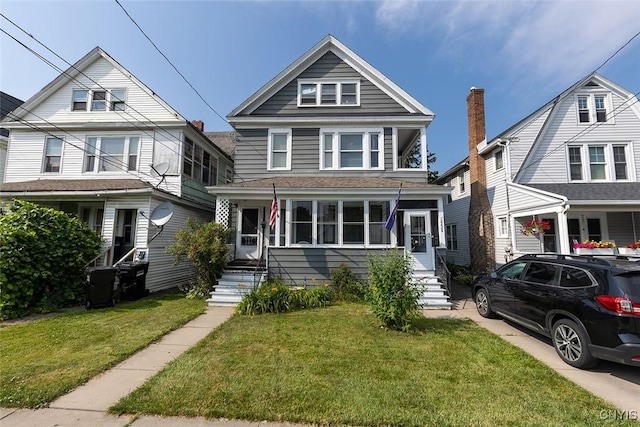 2228-30 Grant Blvd Unit 30, Syracuse, NY 13208 - traditional style home with a front lawn and roof with shingles
