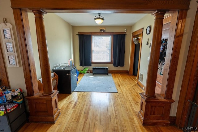 2228-30 Grant Blvd Unit 30, Syracuse, NY 13208 - foyer entrance featuring decorative columns and light wood-style floors