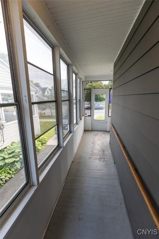 2228-30 Grant Blvd Unit 30, Syracuse, NY 13208 - unfurnished sunroom with wood finished floors