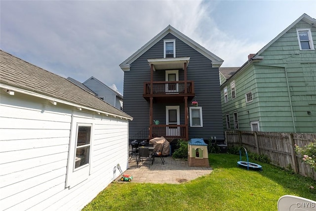 2228-30 Grant Blvd Unit 30, Syracuse, NY 13208 - back of house with a balcony and a patio