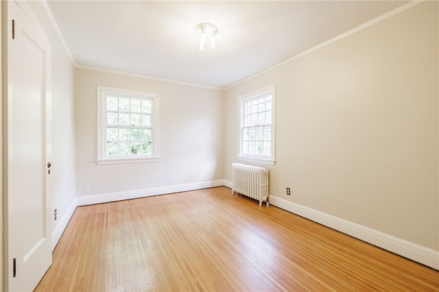 441 Claybourne Rd, Brighton, NY 14618 - unfurnished room featuring radiator heating unit, light wood-style floors, healthy amount of natural light, and ornamental molding