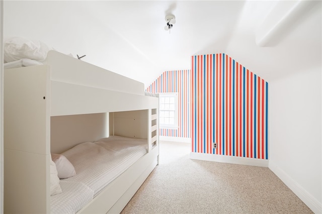 441 Claybourne Rd, Brighton, NY 14618 - unfurnished bedroom featuring lofted ceiling and carpet floors
