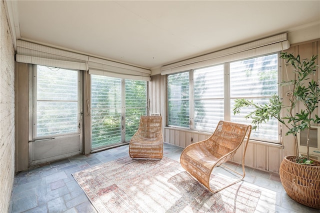 441 Claybourne Rd, Brighton, NY 14618 - sunroom featuring stone tile floors