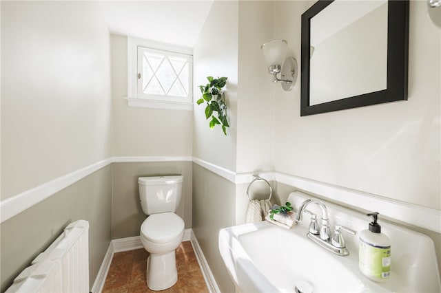 441 Claybourne Rd, Brighton, NY 14618 - bathroom featuring radiator heating unit and tile patterned flooring