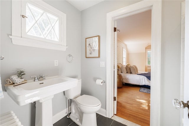 441 Claybourne Rd, Brighton, NY 14618 - ensuite bathroom featuring tile patterned flooring and radiator heating unit