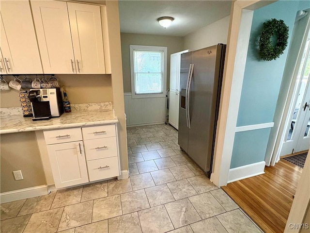 153 Milnor Ave, Syracuse, NY 13224 - kitchen with stainless steel fridge and white cabinets