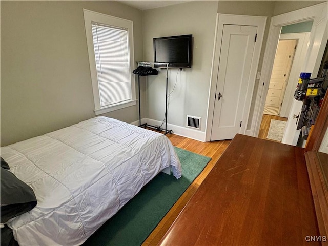 153 Milnor Ave, Syracuse, NY 13224 - bedroom with wood finished floors and baseboards