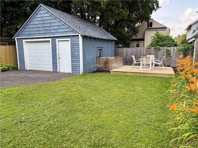 153 Milnor Ave, Syracuse, NY 13224 - view of yard with an outbuilding, a deck, a garage, and driveway