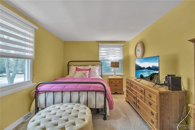 72 Old Lyme Dr Unit 3, Amherst, NY 14221 - bedroom with light colored carpet and baseboards