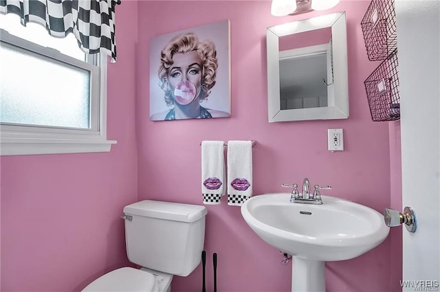 72 Old Lyme Dr Unit 3, Amherst, NY 14221 - half bathroom with toilet and a sink