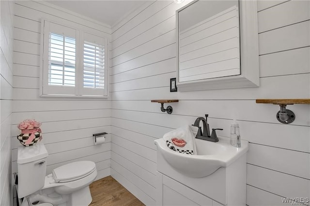72 Old Lyme Dr Unit 3, Amherst, NY 14221 - half bath with vanity, wood finished floors, and wood walls