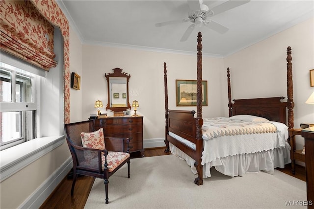 107 Oakland Pl Unit 1, Buffalo, NY 14222 - bedroom featuring ornamental molding, wood finished floors, and a ceiling fan