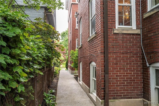 107 Oakland Pl Unit 1, Buffalo, NY 14222 - view of home's exterior with brick siding