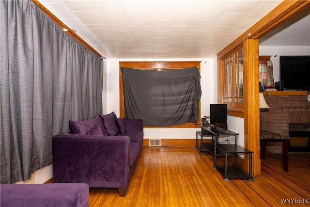 181 Ericson Ave, Buffalo, NY 14215 - living area featuring hardwood / wood-style flooring and a fireplace