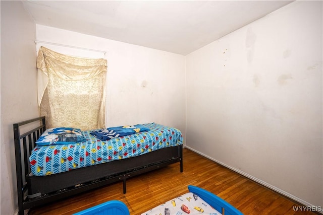 181 Ericson Ave, Buffalo, NY 14215 - bedroom featuring wood finished floors and baseboards
