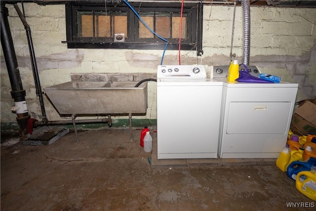 181 Ericson Ave, Buffalo, NY 14215 - unfinished below grade area with washing machine and clothes dryer and a sink