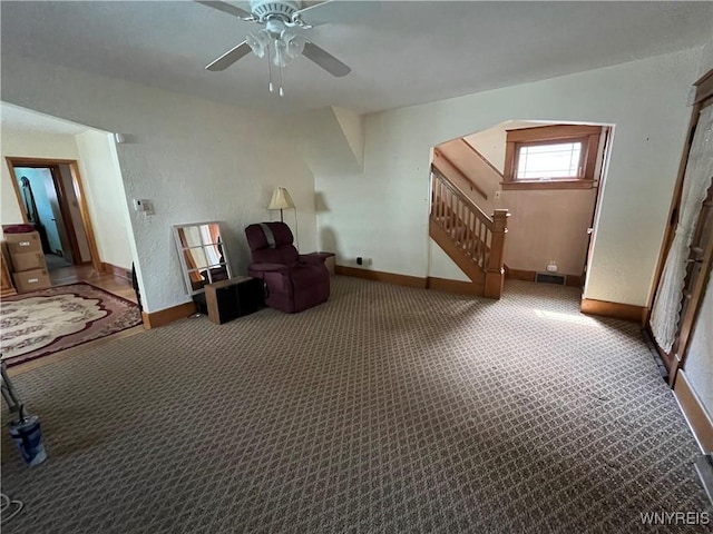 2461 Linwood Ave, Niagara Falls, NY 14305 - sitting room with stairs, carpet floors, and a ceiling fan