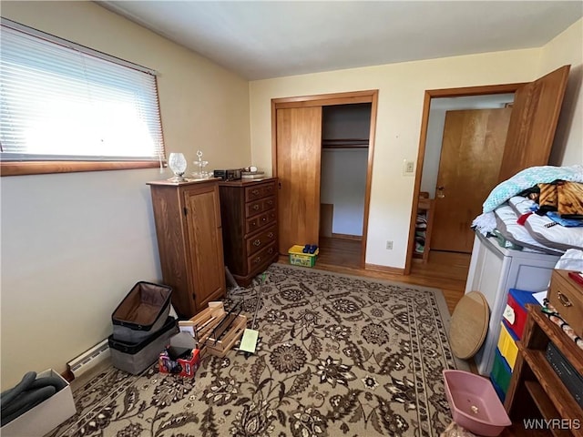 2461 Linwood Ave, Niagara Falls, NY 14305 - bedroom featuring wood finished floors and a closet